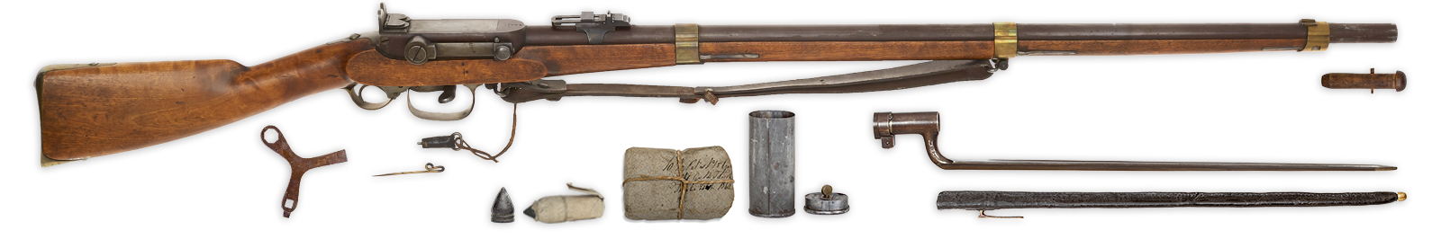 Skarpskyttergevær Modell 1849 med tilbehør. Fra venstre: Skrujern, rømnål,  klikningsstopper, kule, papirpatron, patronpakke, skrujernsdåse med oljeflaske i lokket, bajonett med balg og munningspropp.